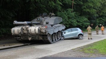 British Tank Completely Demolishes Student Drivers’ Little Toyota