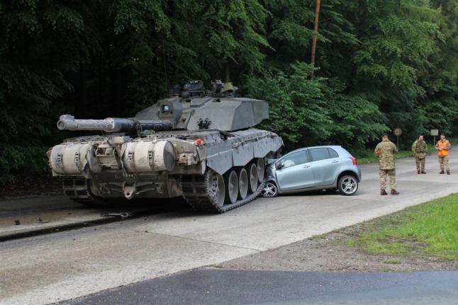 British-tank-crushes-student-drivers-Toyota-in-Germany